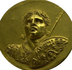 Featured is a photo of an ancient coin depicting Alexander the Great taken by Poland photographer Kriss Szkurlatowski.